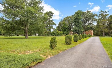 Home sits back off a quiet road minutes from I-295