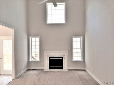 Two story family room with gas fire place