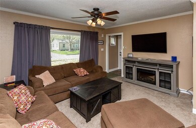Spacious living room with extra large windows!