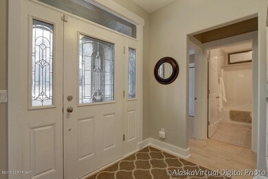 Maple wood flooring throughout.
