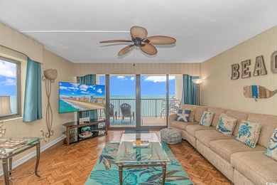 Living room with parquet floors and ceiling fan
