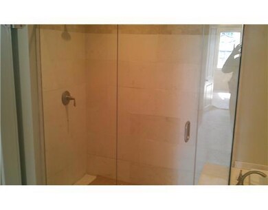 Master Bath/Spa. Large shower with crema marfil ti