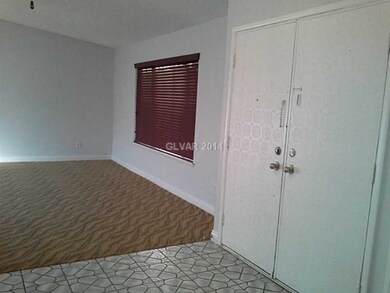 Property Photo. Entry and front Living room