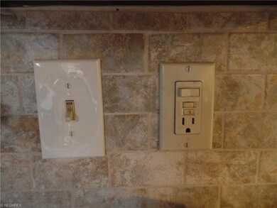 Beautiful backsplash and updated electric.
