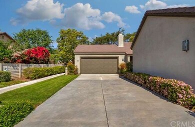 Extended driveway for this unit can accommodate 4 