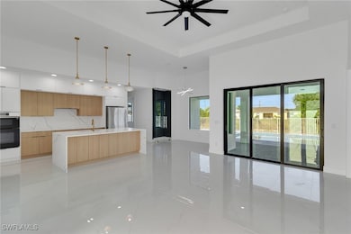 Kitchen featuring modern cabinets, freestanding re