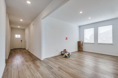 Unfurnished room with light wood-style flooring, b