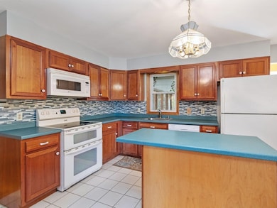 Plenty of wood cabinets!