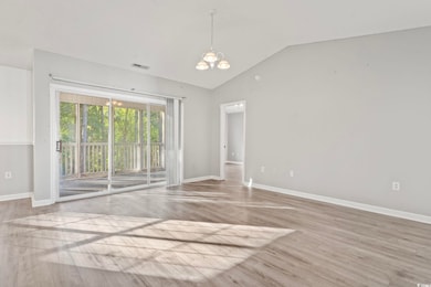 Unfurnished room with visible vents, baseboards, a