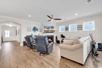 Living room featuring light hardwood / wood-style 
