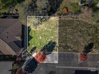 Aerial view of property and surrounding area with property boundaries highlighted