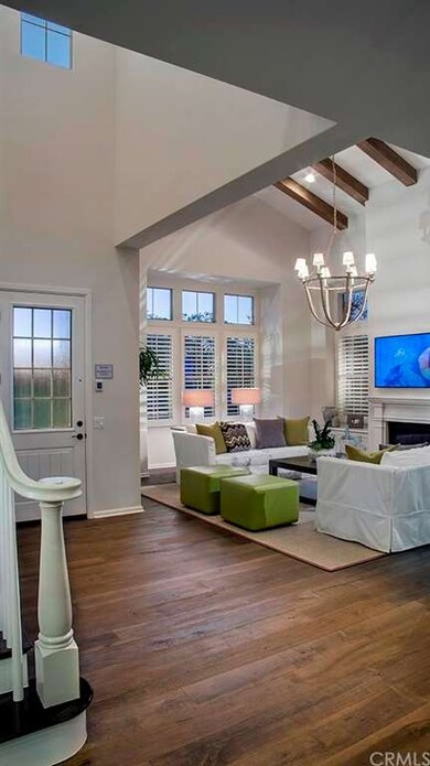 Beautiful entry and warm and inviting living room,