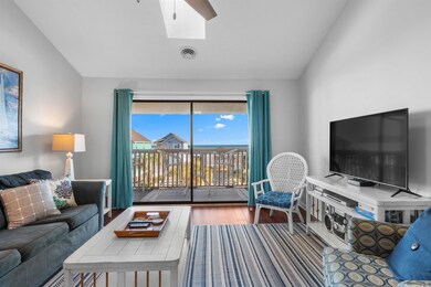 Living room featuring hardwood / wood-style floori