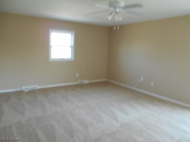 master suite..walk in closet..newer carpeting..