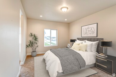 Bedroom featuring recessed lighting and carpet flooring