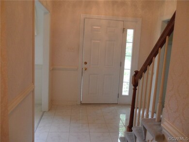 foyer with marble tile