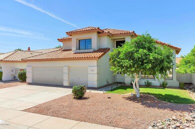12370 N 54th Dr-large-002-14-Front Exter