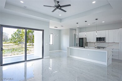 Kitchen featuring appliances with stainless steel