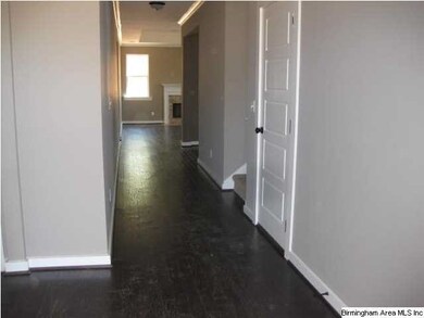 Formal foyer allows privacy for home owners.  Plen