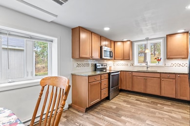 8 Royal Coachman Way