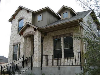 View of front of property featuring stone siding 