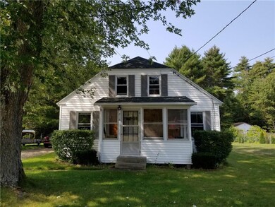 Front foyer is a small glassed in porch.