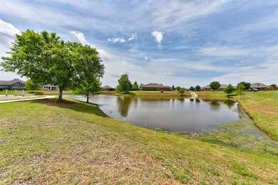 Water view with nearby suburban area