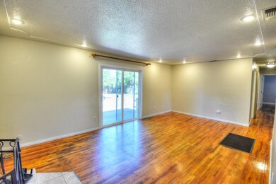 Living room with access to backyard