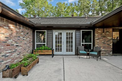 The patio is off the Sun Room is great for herb and pot gardening.