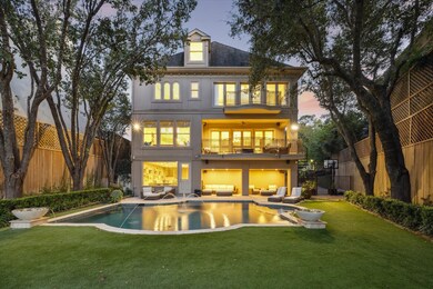 The backyard of this luxury estate is an oasis fea