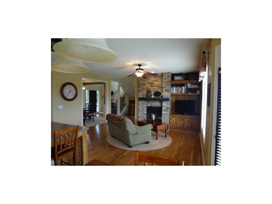 Stacked stone hearth and see-through fireplace, sh