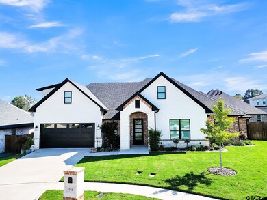 This 2021 build by Hunt Custom Home Builders has a