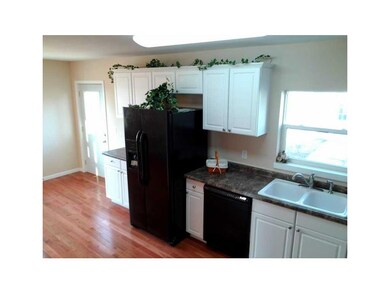 Kitchen. Side by side refrigerator, dishwasher, ga