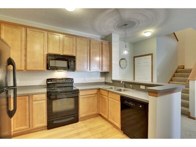 Lots of cabinets and counter space here...