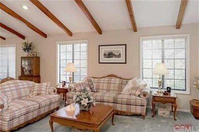 Inviting formal living room with lovely views.