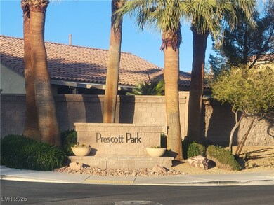 Community sign featuring fence