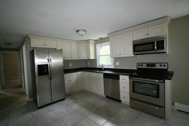 Kitchen with tile flooring