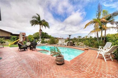 Entertainer's backyard, with brick patio, beautifu