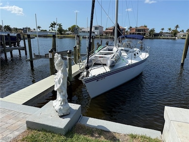 Dock featuring a water view and a residential view