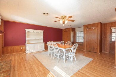 Living or Dining area featuring ceiling fan and li