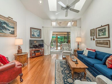 Open and bright living area with hardwood floors