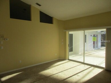 LIVING ROOM ACROSS FROM DINING  WITH POCKET SLIDER