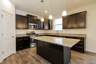 Similar home pictured- features and options will v