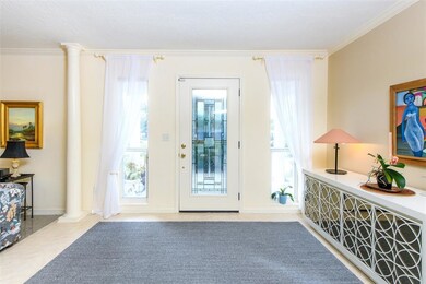 Wide entry to the living room and dining area