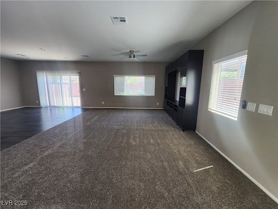 Unfurnished living room featuring healthy amount o