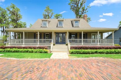 Front porch and brick circular driveway