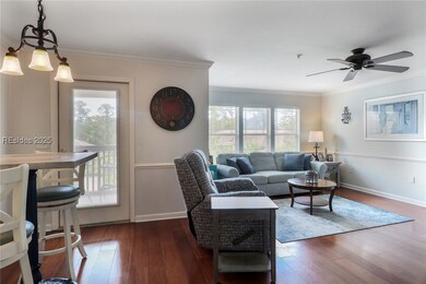 Combination living and dining area with access doo