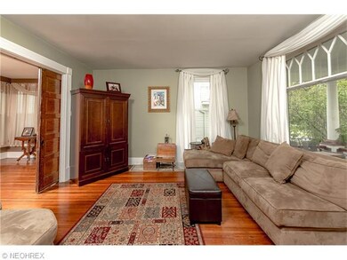 Hardwoods Throughout the First Floor. Don't Miss the Gorgeous Pocket Doors and 9' Ceilings!