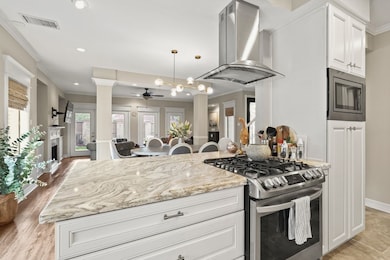 Open concept living at its finest! The kitchen ope