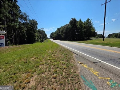 Side view of lot facing Hwy 53 east